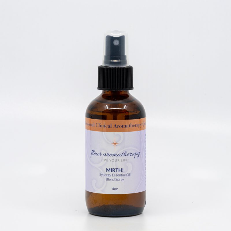 A bottle of aromatherapy spray sitting on top of a table.