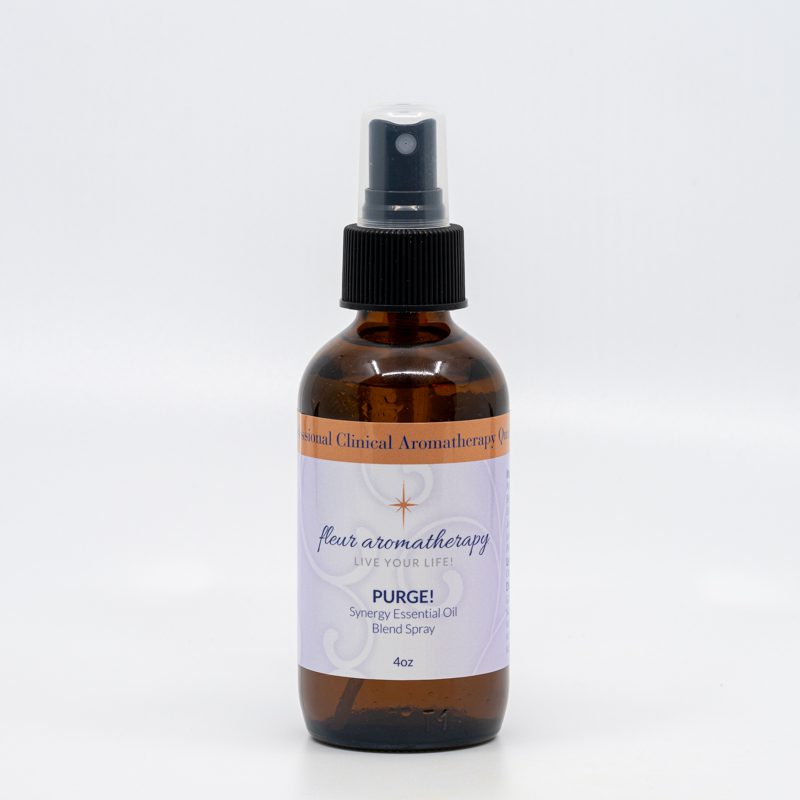 A bottle of aromatherapy oil is sitting on the table.